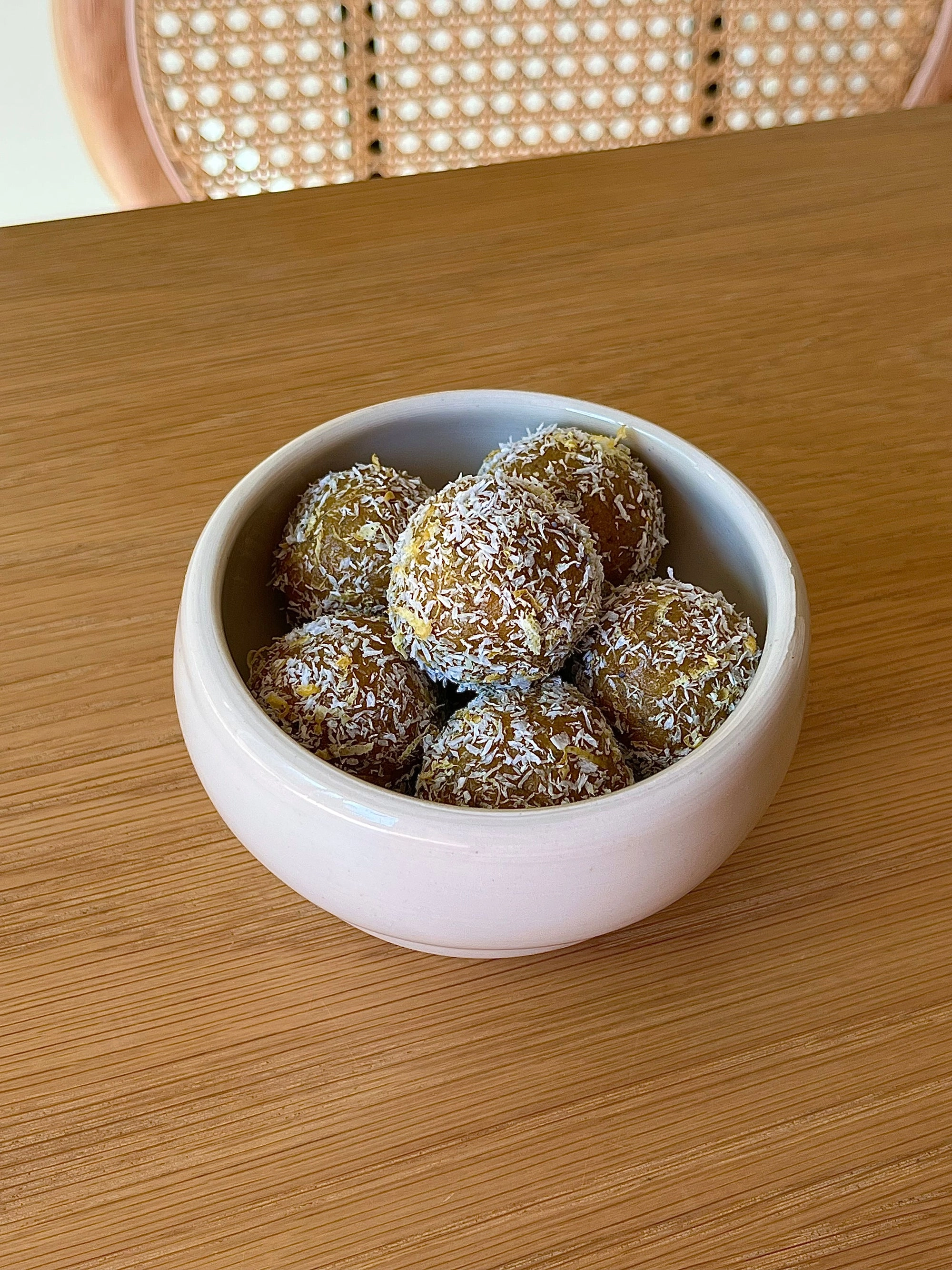 Lemon Turmeric Poppyseed Bites in a white bowl