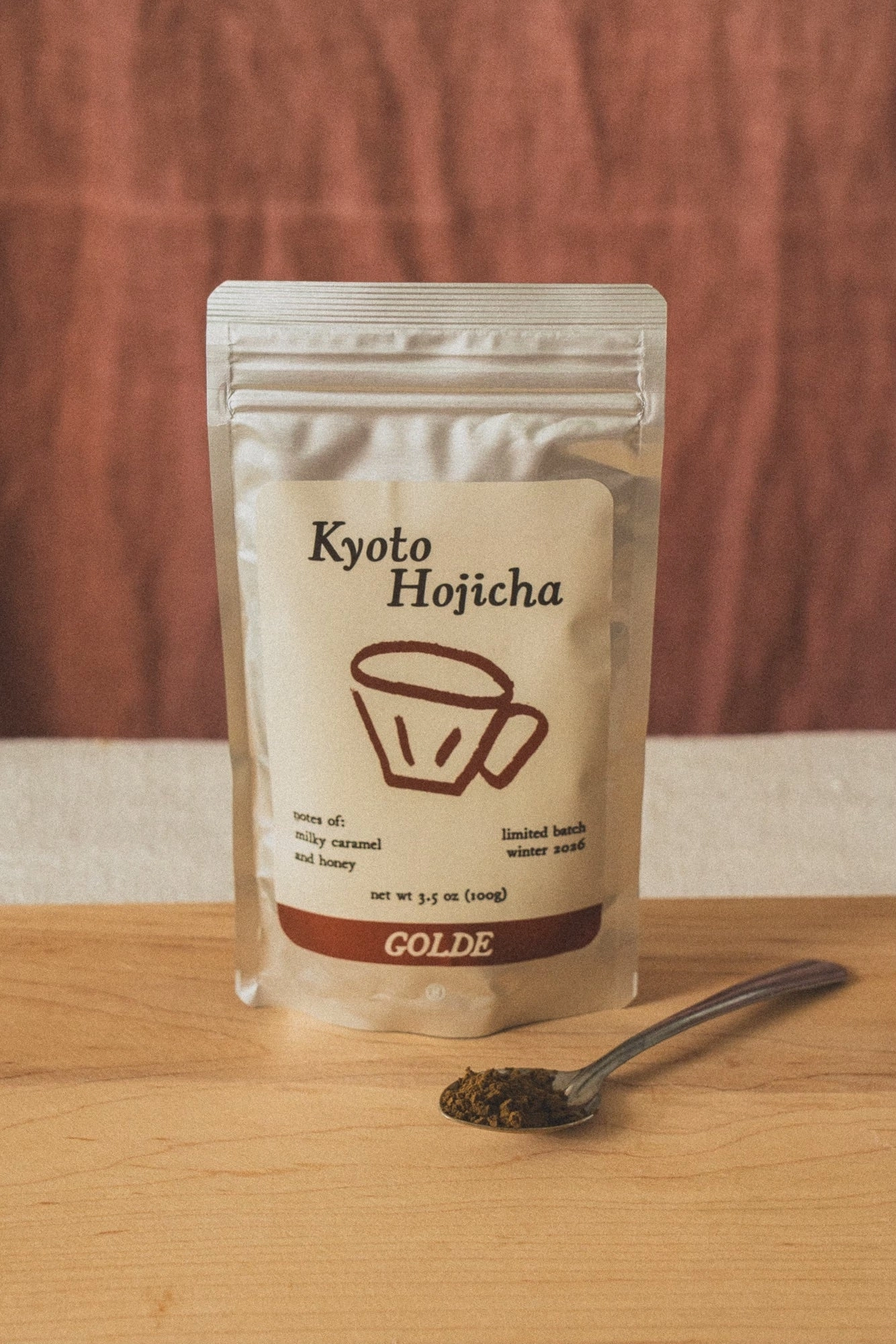 Kyoto Hojicha pouch standing on a wooden table